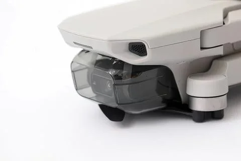 Close-up of a compact drone with camera on white background Stock Photos