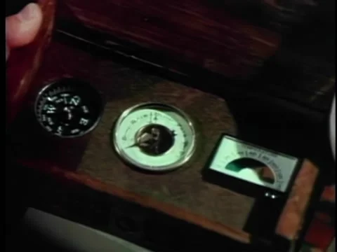 Close-up of compass and barometer in wooden box Stock Footage 260254804