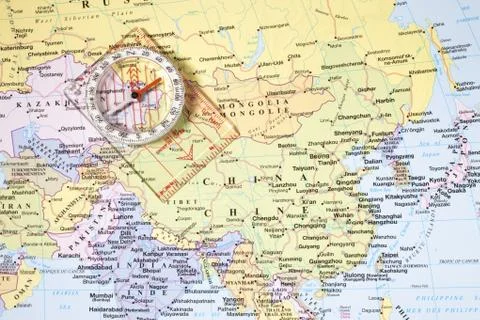 Close up of compass and map Stock Photos