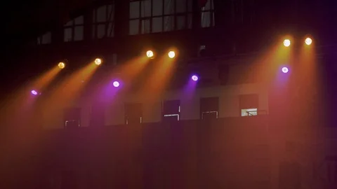 Close up of complementary color spotlight illuminating the stadium Stock Footage 113132463
