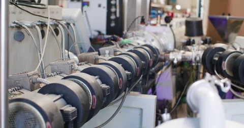 Close up of complex industrial machinery with cables and metal components Stockbeeldmateriaal 329560720