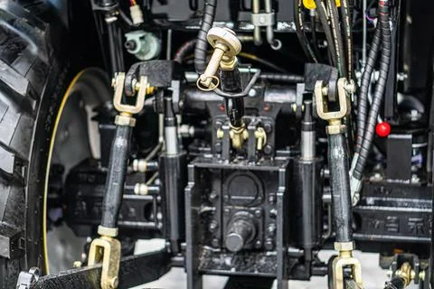 Close-up of complex mechanical structure, likely industrial tractor or heavy  Stock Photos