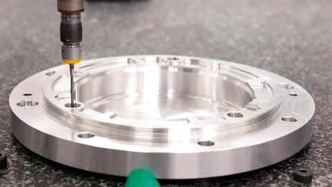 Close Up Of Component Being Worked On In CNC Machine Stock Photos