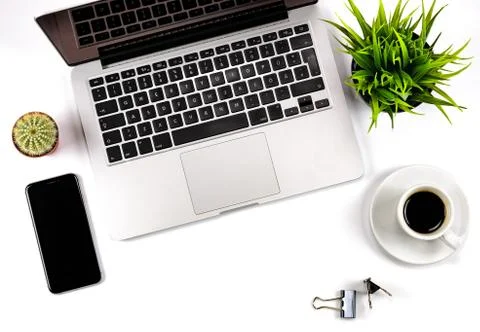 Close-up composition of office workspace with blank screen smartphone Stock Photos