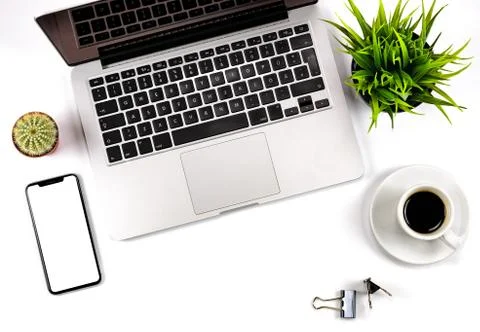 Close-up composition of office workspace with cup of coffee Stock Photos