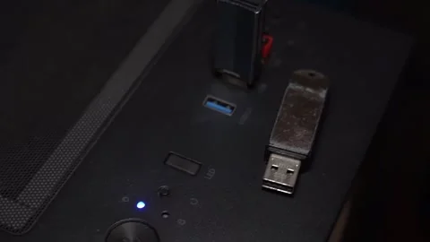 Close-up of a computer case showing USB ports and a USB flash drive Stock Footage 327132523