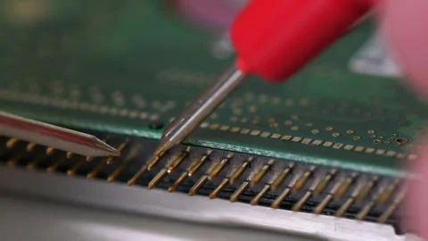 A close up of a computer chip with a green background Video stock 313357077