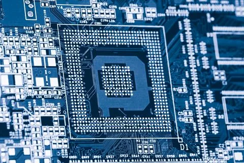 A close up of a computer chip with the letter Q on it. Concept of technology  Foto stock