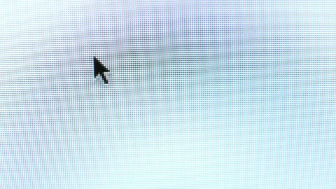 Close up of a computer cursor moving into frame Stock Footage