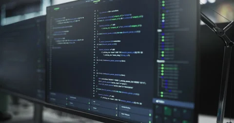 Close Up Computer Display with Software Code 動画素材 243556097