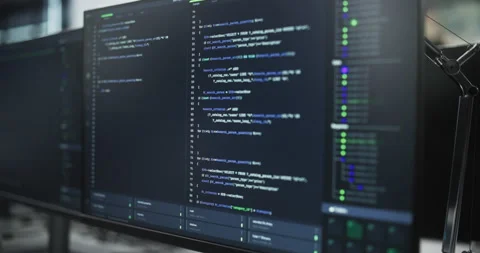 Close Up Computer Display with Software Code 動画素材 243556136
