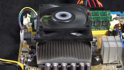 Close-Up of Computer Fan and Circuit Board Components in Operation - C0062 Stock Footage 293856471