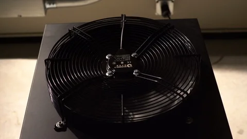 Close up of a computer fan spinning and cooling down the processor. Stock Footage 85619533