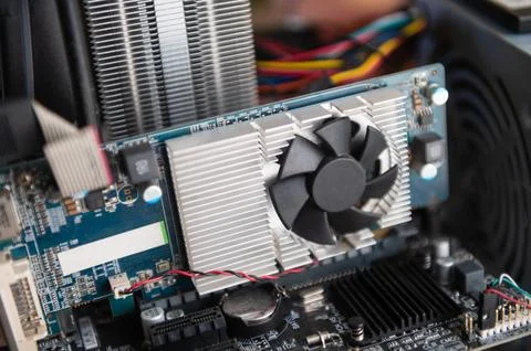 Close up of computer graphics card with cooling fan components Stock Photos