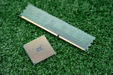 Close up of computer hardware on artificial grass Stock Photos