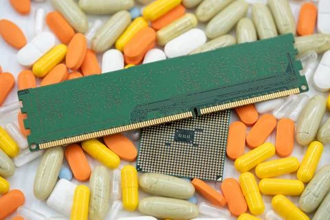 Close up of computer hardware on pills with health technology concept Stock Photos