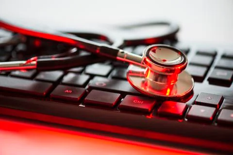 Close up of computer keyboard and stethoscope, studio shot Foto stock
