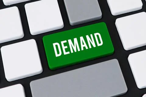 Close-up of a computer keyboard featuring a green key with white text that .. Stock Photos