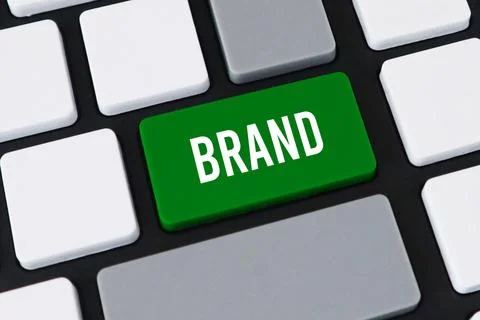 Close-up of a computer keyboard featuring a green key with white text that .. Stock Photos