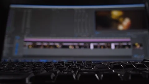 Close-up, computer keyboard, a man's hand clicks on the keys. On the monitor Stock Footage 105288564