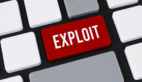 Close-up of a computer keyboard with a prominent red key featuring the whit.. 스톡 사진