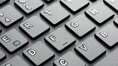 Close up computer keyboard slowly rotating Video stock 127447202