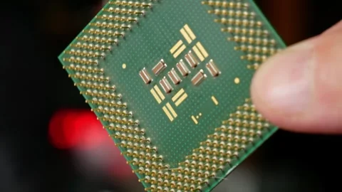 Close-up of a computer microprocessor in hands Stock Footage 284479665