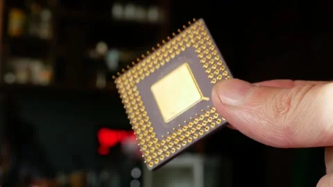 Close-up of a computer microprocessor in hands Stock Footage 284479675
