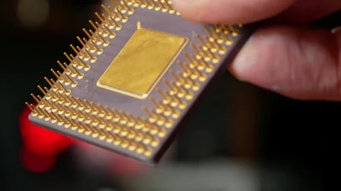 Close-up of a computer microprocessor in hands Stock Footage 284479677