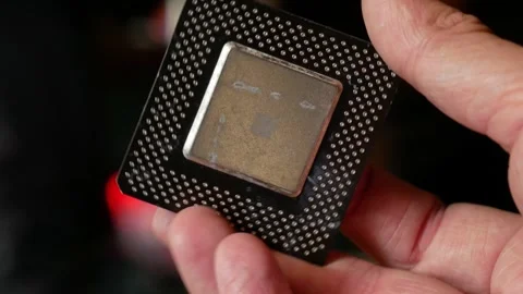 Close-up of a computer microprocessor in hands Stock Footage 284479689