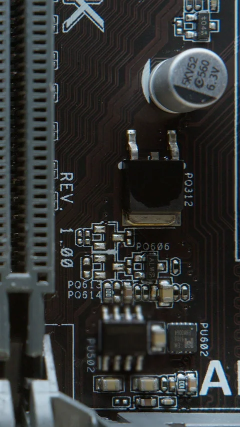 Close-up of a computer motherboard during electric current testing, showing.. Stock Footage 311339939