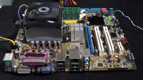 Close-Up of Computer Motherboard with Various Electronic Components - C0066 Stock Footage 293856393