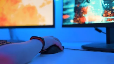 Close up of computer mouse being used in action video game Stock Footage 122525230