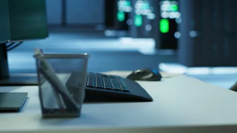 Close up on computer peripherals used by employees in data center Stock Footage 280800119