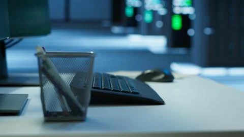 Close up on computer peripherals used by employees in data center 库存照片