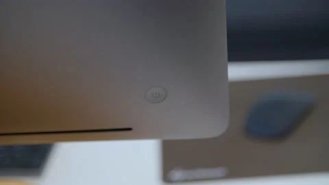 Close up of a computer power button being activated Stock Footage 144282011