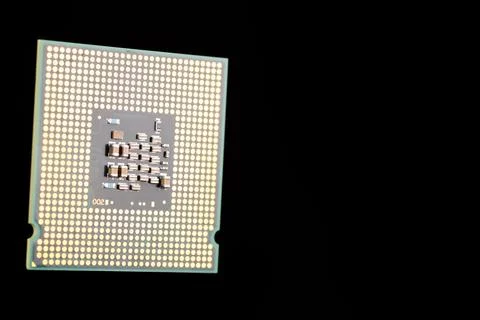 Close-Up of a Computer Processor Isolated on a Black Background Stock Photos
