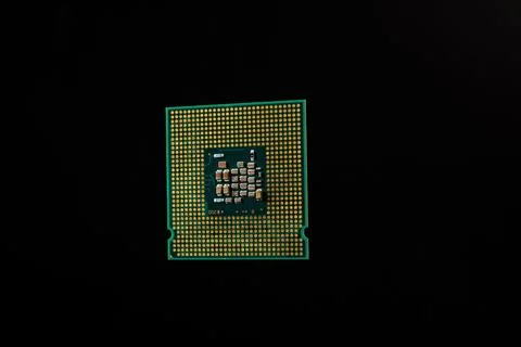 Close-Up of a Computer Processor Isolated on a Black Background 스톡 사진