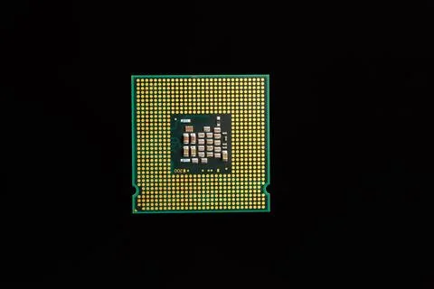 Close-Up of a Computer Processor Isolated on a Black Background Stock Photos