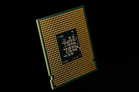 Close-Up of a Computer Processor Isolated on a Black Background Stock Photos