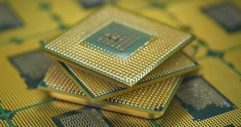 Close-up of computer processors with intricate golden pins and contacts Stock Footage 344697887