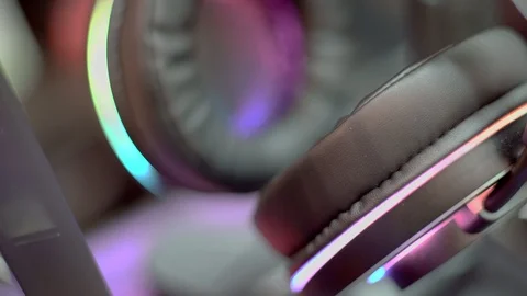 Close up of Computer RGB gaming headphone, Illuminated by colored LED Stock Footage 119158847
