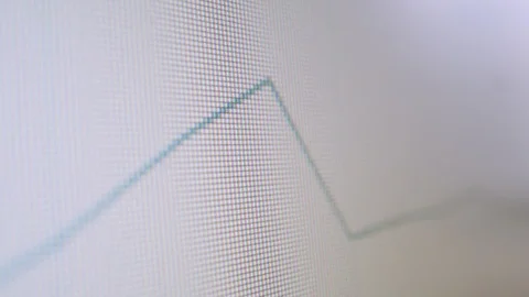 Close-up of computer screen with blue graph and computer mouse Stock Footage 126957749