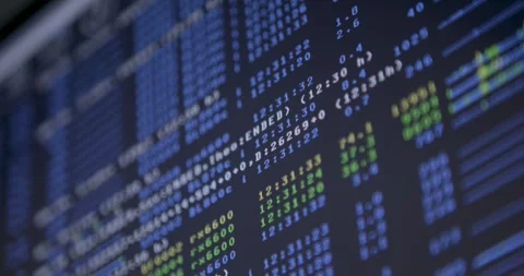Close-up of computer screen displaying code with a rack focus technique Stock Footage 262750477