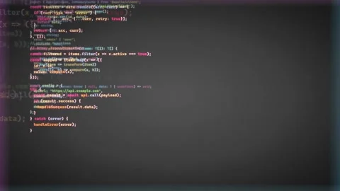 Close up of computer screen displaying scrolling lines of colorful programming Stock Footage 339973210
