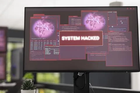 Close up of computer screen displaying system hacked alerts Stock-Fotos