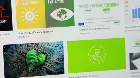 Close Up of Computer Screen During Online Scroll Through Green Energy Solutions Video stock 156555211