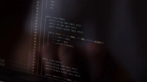 Close-up of a computer screen with lines of program code. The programmer will Stock Footage 236563762