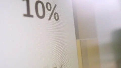 Close-up of computer screen with percentage Stock Footage 126957930
