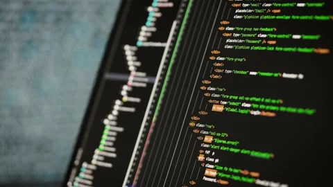 Close-up of a computer screen, with program code. A major project is being Stock Footage 173039241